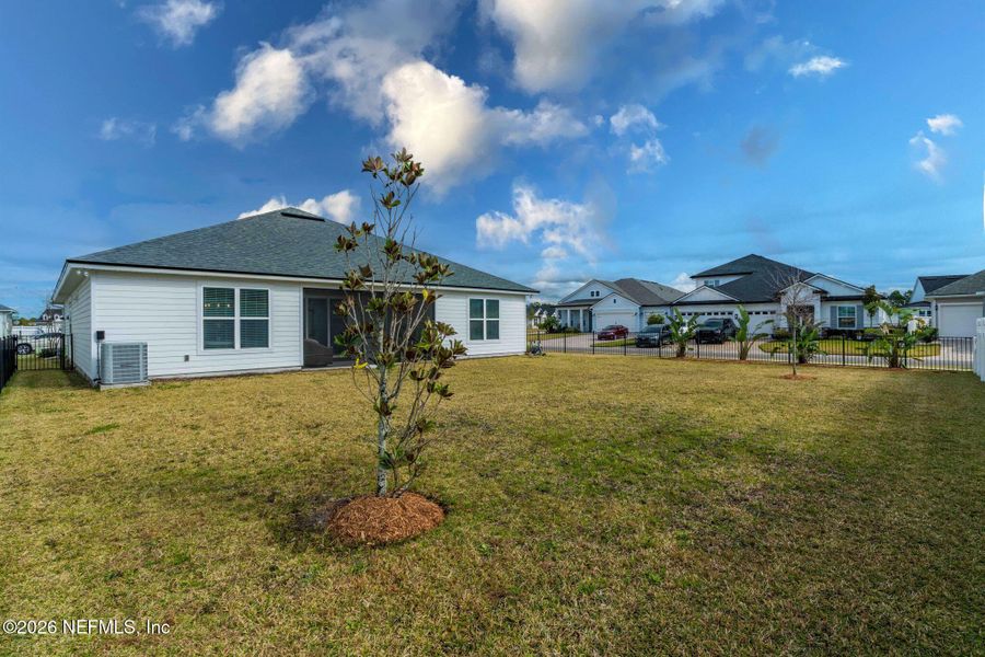 Exterior details and patio area of a home in Courtney Oaks in SilverLeaf, St. Augustine (Image 27).