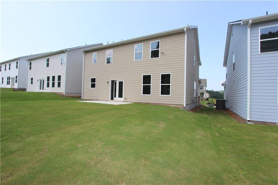 Exterior details and patio area of a home in Clark Farms, Flowery Branch (Image 3).