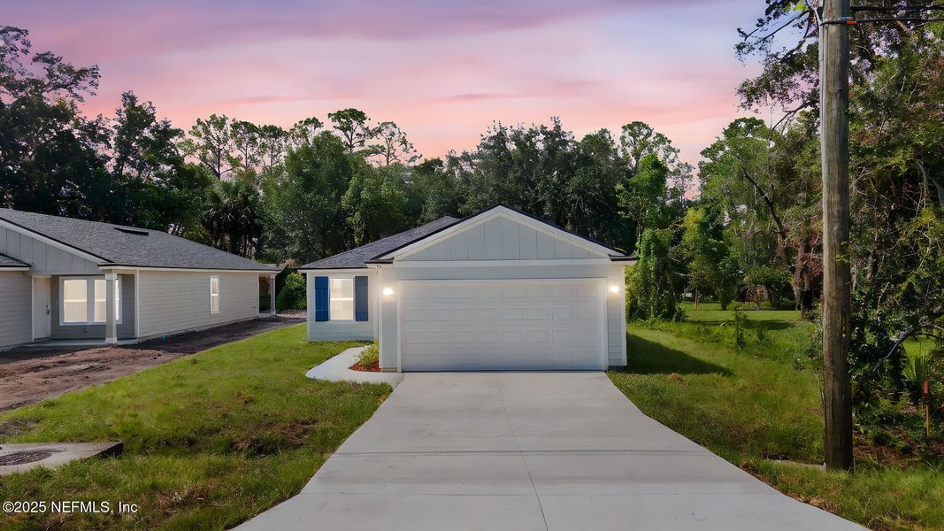 Front exterior of a new home in , Green Cove Springs, FL, highlighting curb appeal (Image 27).