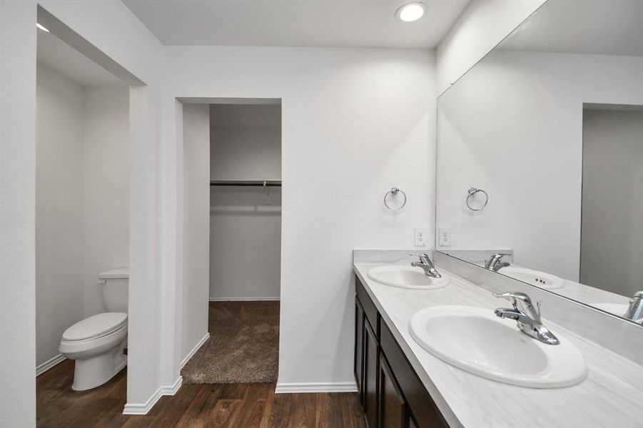 Ensuite bathroom in the primary bedroom.