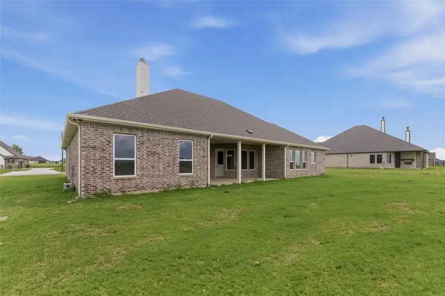 Exterior details and patio area of a home in Fannin Ranch, Leonard (Image 4).