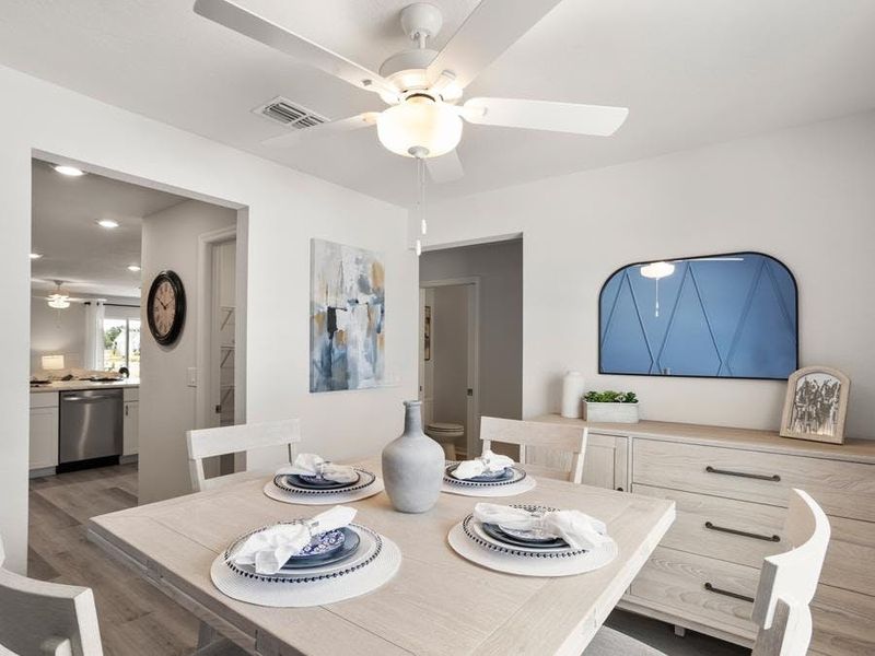Flex space can serve as a dining room, or however suits your needs - Catalina townhome by Highland Homes Flex space can serve as a dining room, or however suits your needs - Catalina townhome by Highland Homes
