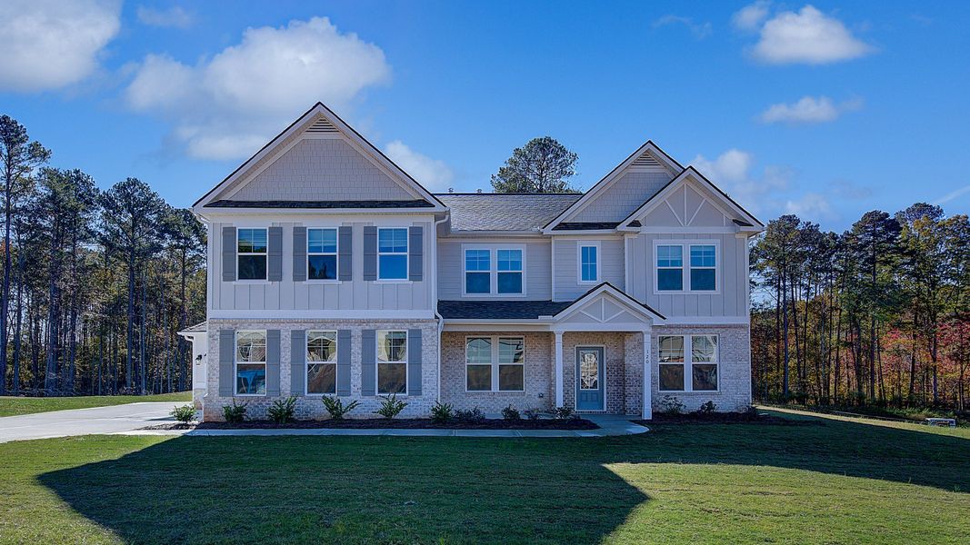 Front exterior of a new home in Riverbend Overlook, Fayetteville, GA, highlighting curb appeal (Image 1).