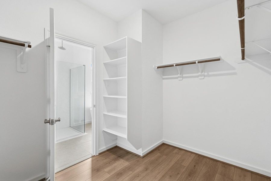 Huge primary walk-in closet Huge primary walk-in closet