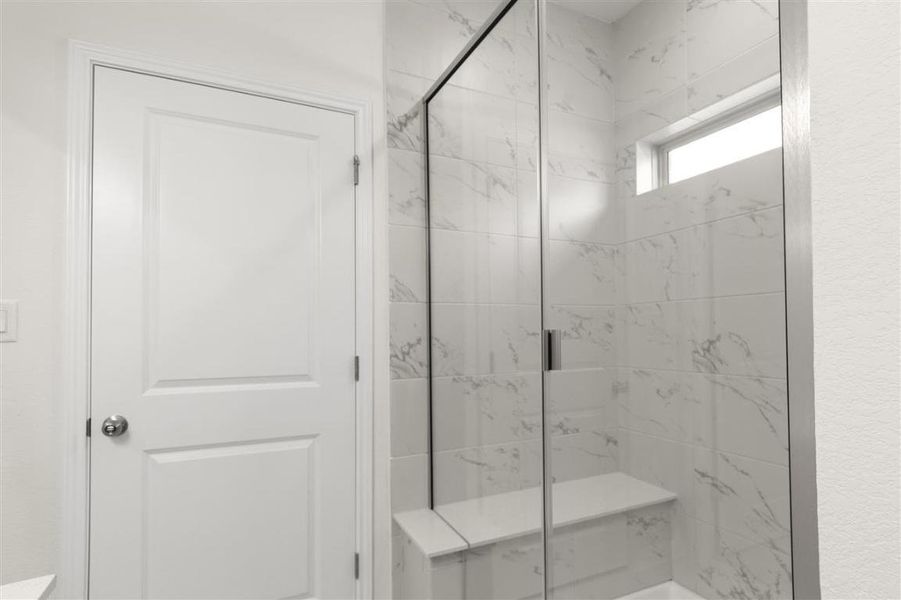 Full bathroom featuring a marble finish shower