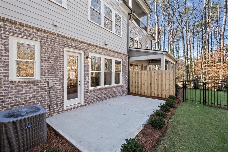 Exterior details and patio area of a home in Devin's Shire - A Kennesaw Tradition, Kennesaw (Image 22).