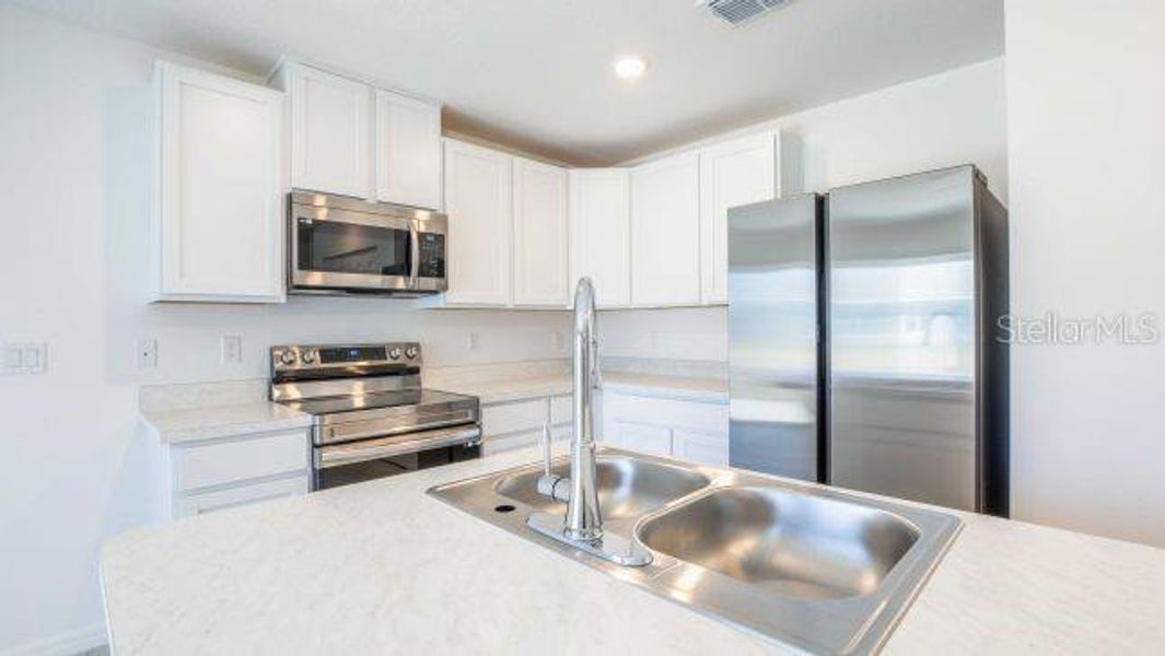 Furnished interior view inside a new home in Royal Highlands, Weeki Wachee (Image 10).
