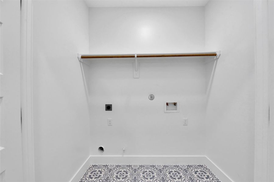 The utllity closet is right off the third bedroom with space to store all your laundry supplies.