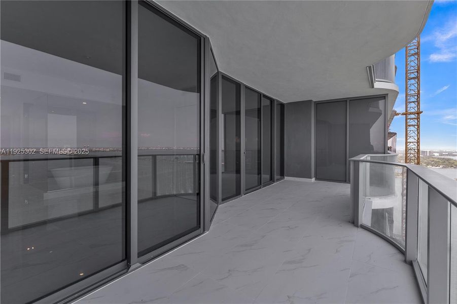 Exterior details and patio area of a home in Aria Reserve, Miami (Image 25).