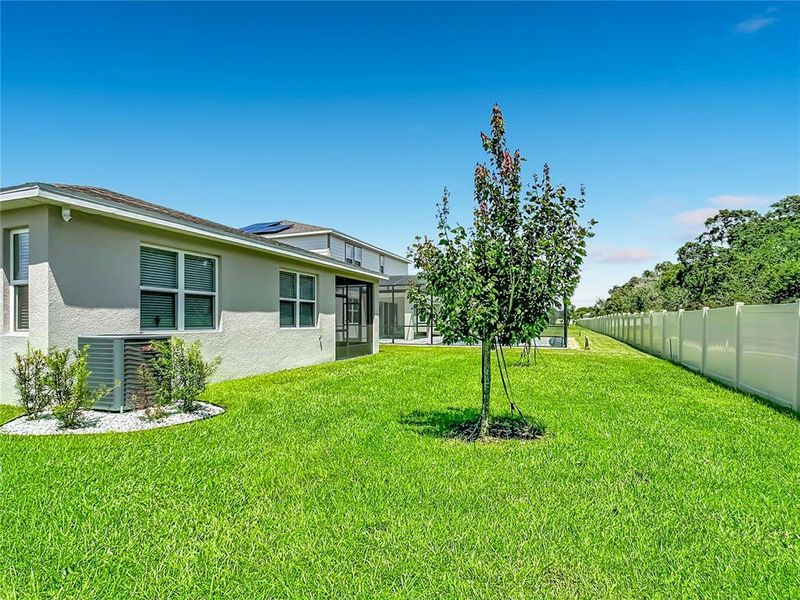 Exterior details and patio area of a home in Seasons at Big Sky, Kissimmee (Image 32).