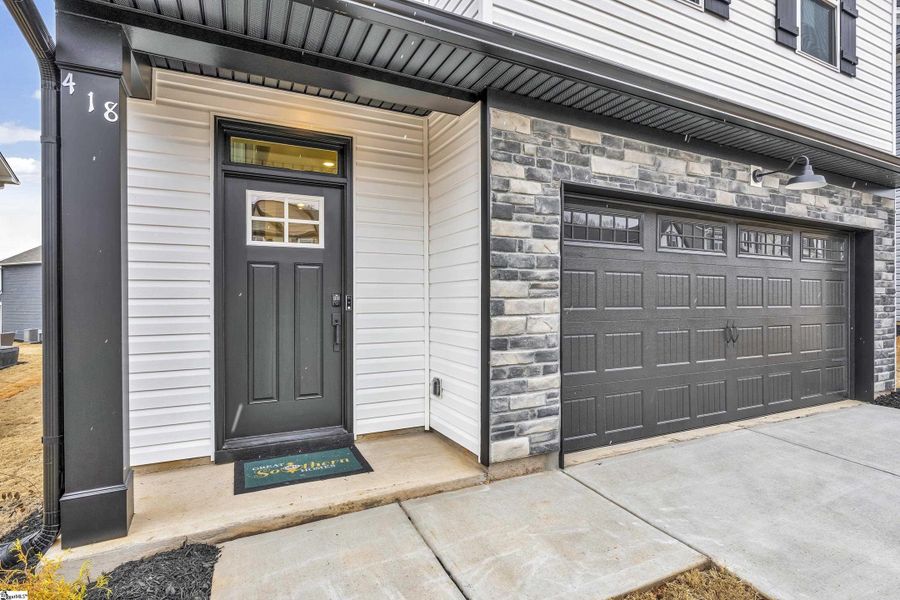 Exterior details and patio area of a home in Sedona, Greenville (Image 2).