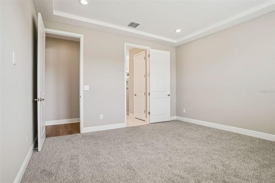 Spacious, unfurnished interior of a new home in Legends Preserve - Signature Series, Daytona Beach (Image 32).