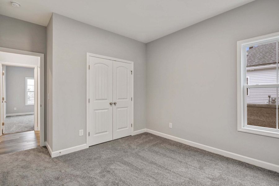 Representative unfurnished interior of a home built from the Garland by Caviness & Cates Communities in Bartlett Manor, Youngsville (Image 244). Representative unfurnished interior of a home built from the Garland by Caviness & Cates Communities in Bartlett Manor, Youngsville (Image 244).