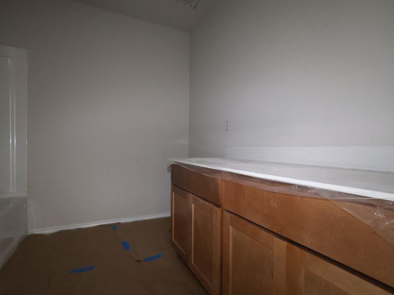In-progress construction of a new home in Carillon, Manor, TX (Image 4).