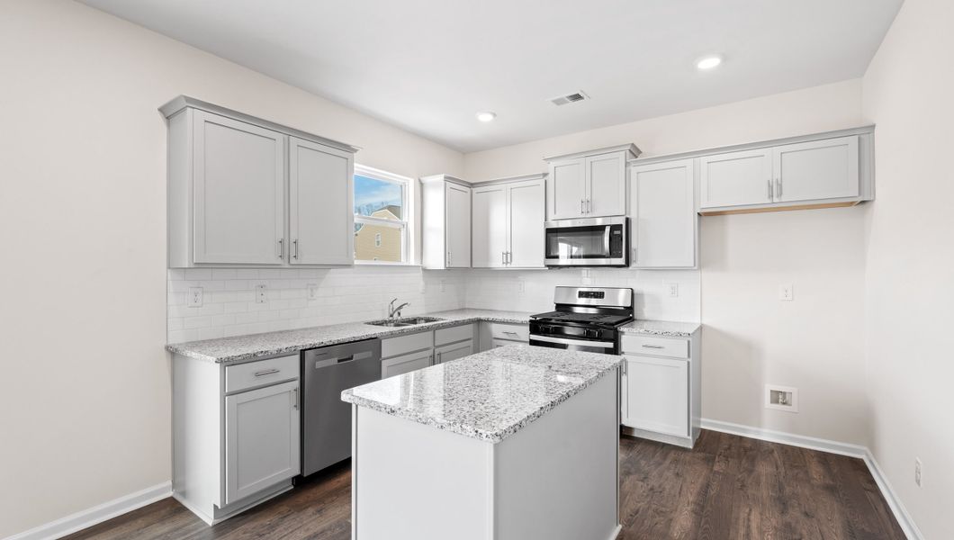 Representative furnished interior of a home built from the Biltmore by D.R. Horton in Hunters Ridge, Woodruff (Image 7).