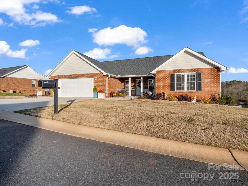 Front exterior of a new home in , Spindale, NC, highlighting curb appeal (Image 2). Front exterior of a new home in , Spindale, NC, highlighting curb appeal (Image 2).