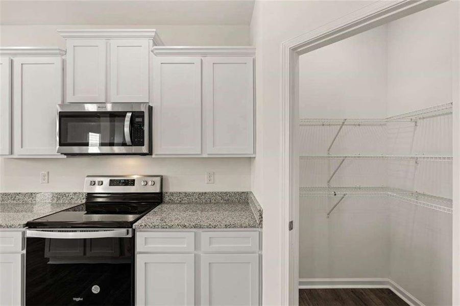 Furnished interior view inside a new home in Oakchase at Hampton, Hampton (Image 5).