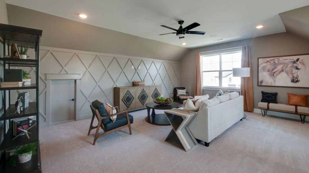 Large upstairs bonus room for movie and game nights Large upstairs bonus room for movie and game nights