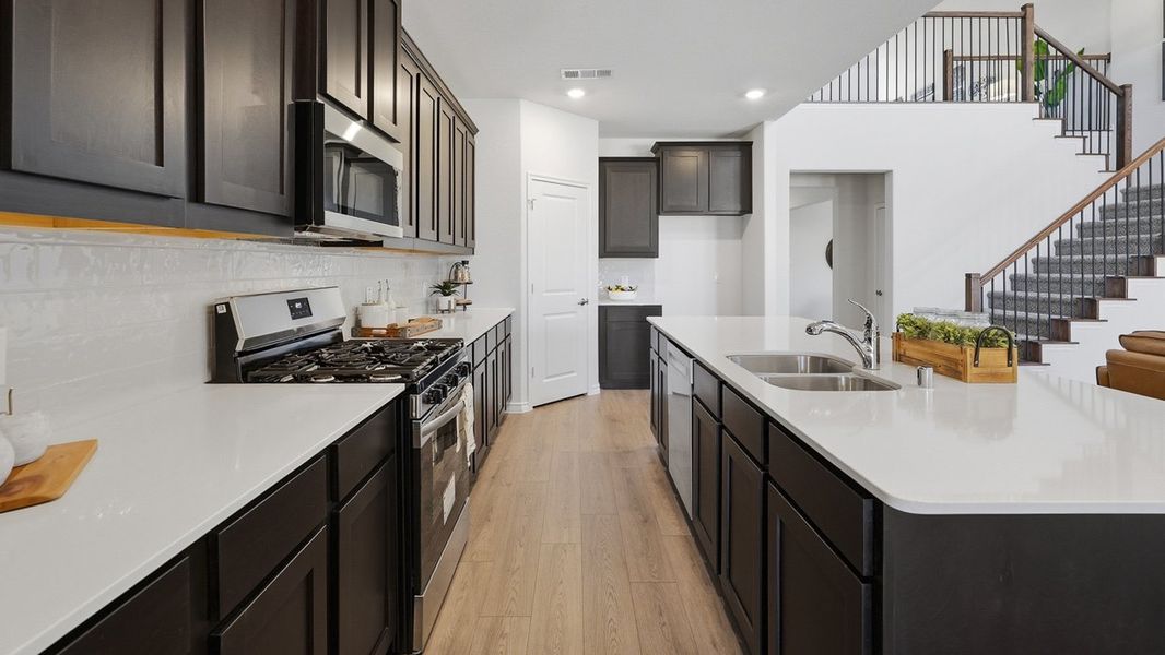 Representative furnished interior of a home built from the Evergreen by D.R. Horton in The Woods at Lindsey Place, Anna (Image 6).