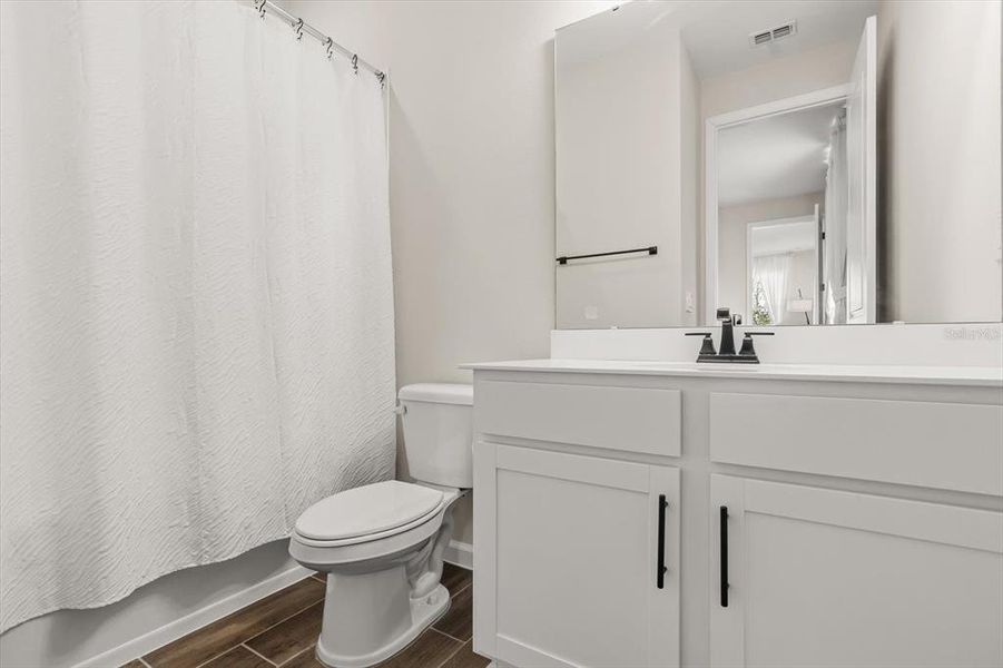 Furnished interior view inside a new home in Seasons at Lakeside Forest, Tavares (Image 12).