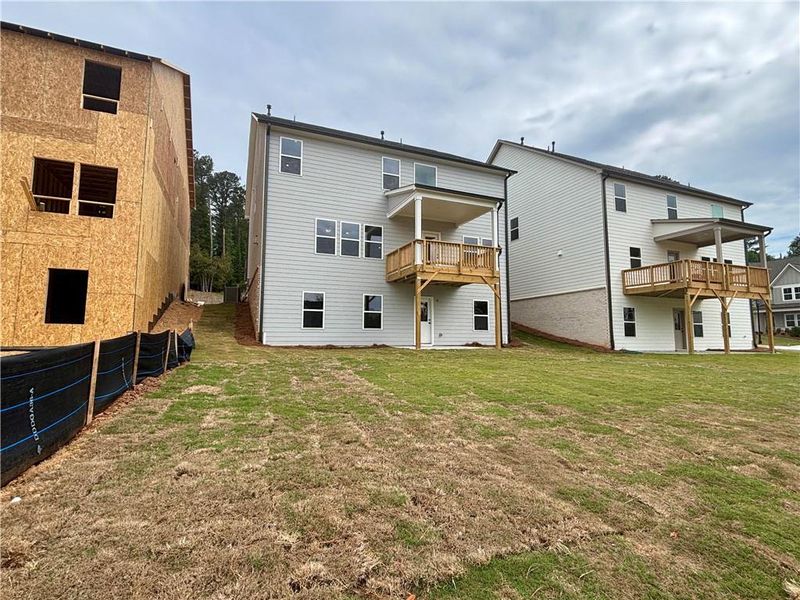 Exterior details and patio area of a home in Arbors at Richland Creek, Buford (Image 4).