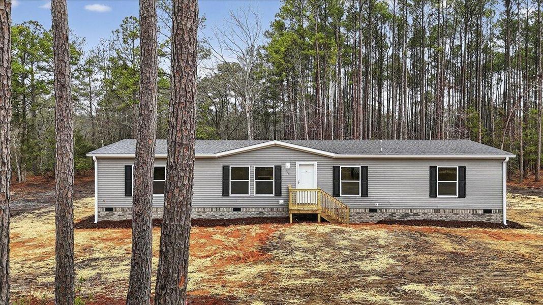 Exterior details and patio area of a home in , Walterboro (Image 24).