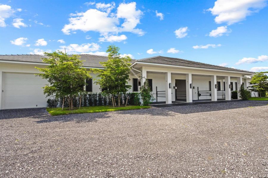 Exterior details and patio area of a home in , Wellington (Image 33). Exterior details and patio area of a home in , Wellington (Image 33).