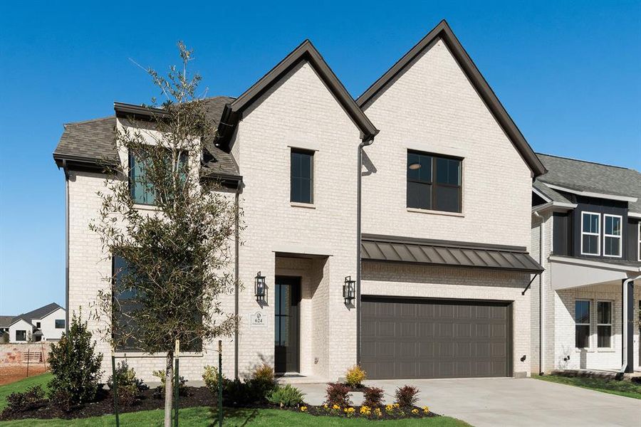 View of front of home with brick siding, a garage, concrete driveway, and a shingled roof