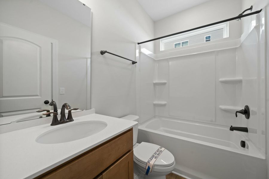 Furnished interior view inside a new home in Cottages at Piper Village, Trinity (Image 10).