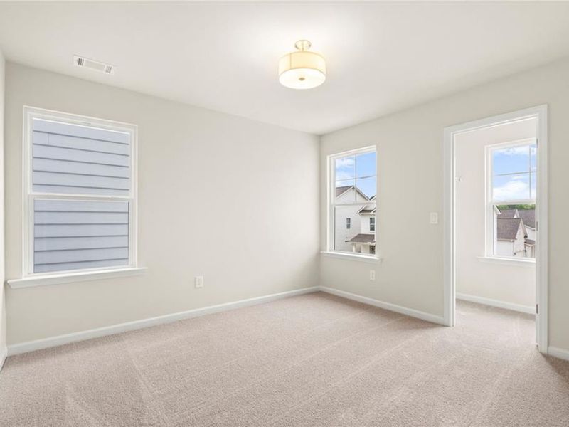 Spacious, unfurnished interior of a new home in The Village at Shallowford, Kennesaw (Image 33).