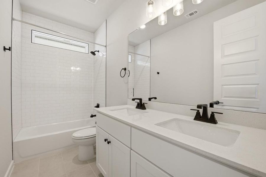 Furnished interior view inside a new home in Heritage, Dripping Springs (Image 14).