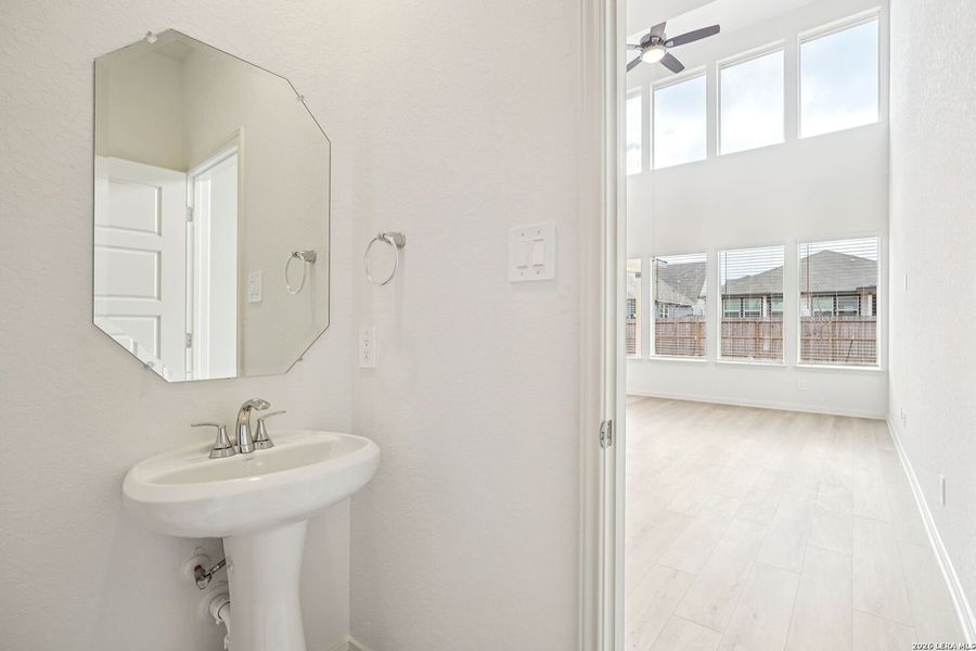 Furnished interior view inside a new home in Estancia Ranch - Classic Series, San Antonio (Image 9).