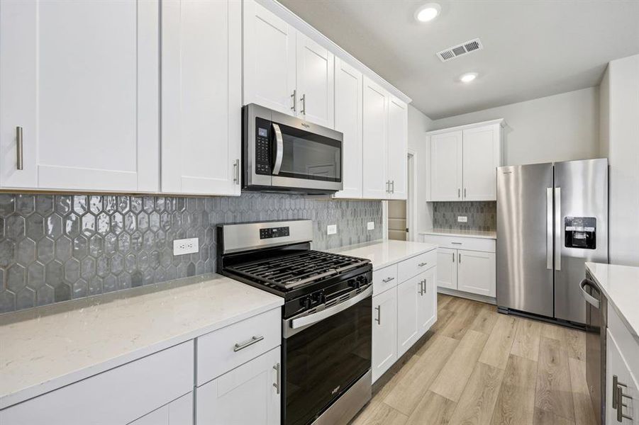 Photo is not of the actual home, but is an inspirational photo of builder’s model home and may depict options, furnishings, and/or decorator features that are not included.