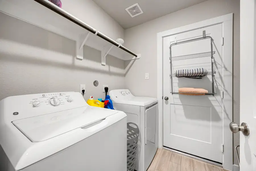 Furnished interior view inside a new home in Marvida, Cypress (Image 11).