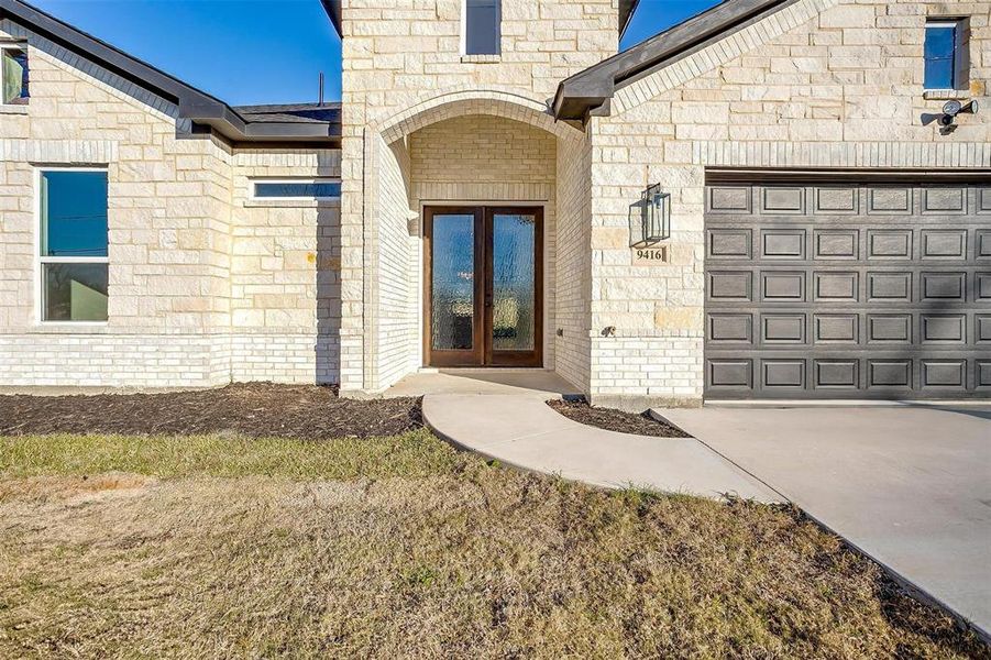 View of exterior entry with french doors