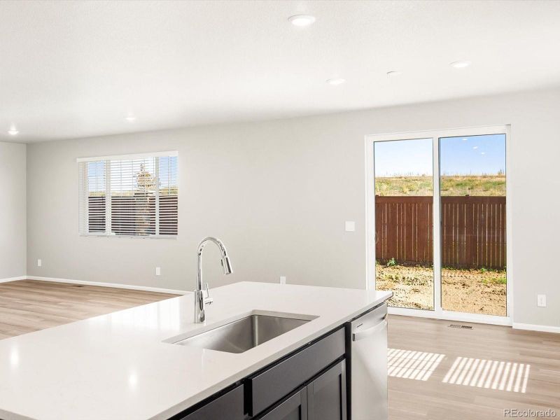 Furnished interior view inside a new home in Buffalo Highlands: The Flora Collection, Commerce City (Image 13).