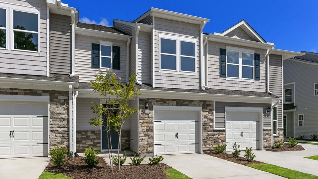 Exterior details and patio area of a home in Chapel Townes, Raleigh (Image 2). Exterior details and patio area of a home in Chapel Townes, Raleigh (Image 2).
