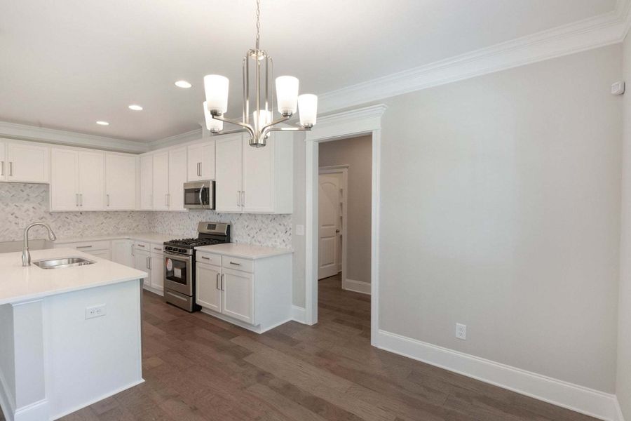 Representative furnished interior of a home built from the Austin by Caviness & Cates Communities in Bartlett Manor, Youngsville (Image 122).