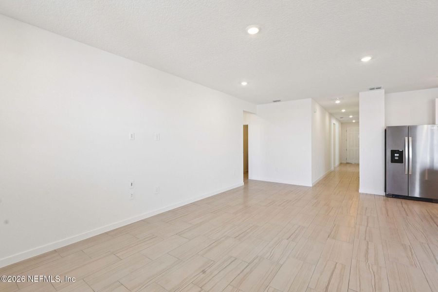 Spacious, unfurnished interior of a new home in Lakes at Bella Lago - Signature Series, Green Cove Springs (Image 18).