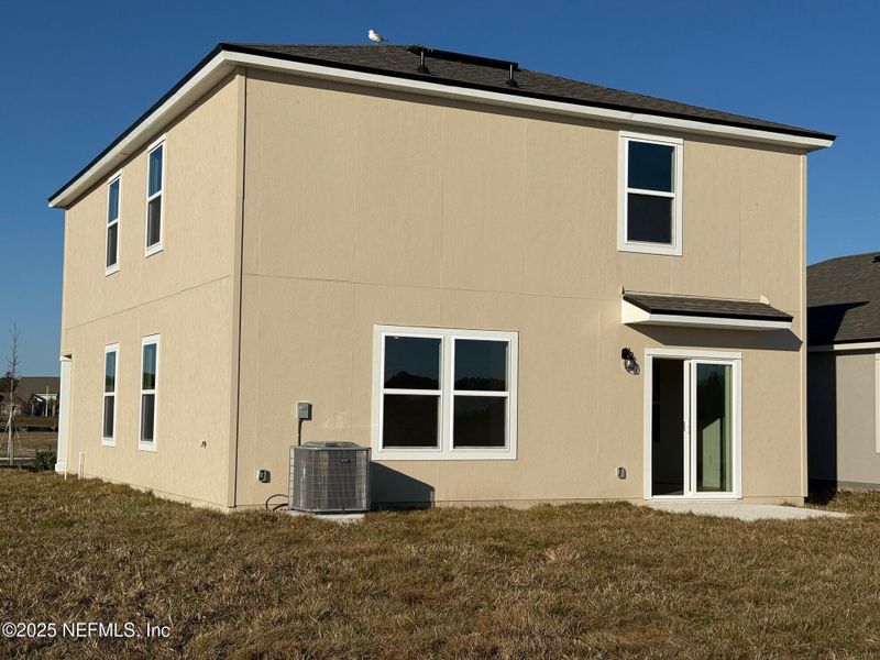 Exterior details and patio area of a home in The Arbors, Jacksonville (Image 3).