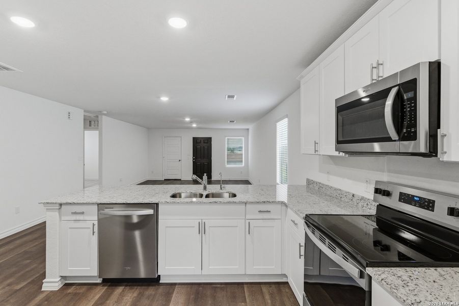Furnished interior view inside a new home in Vista Real, Converse (Image 12).