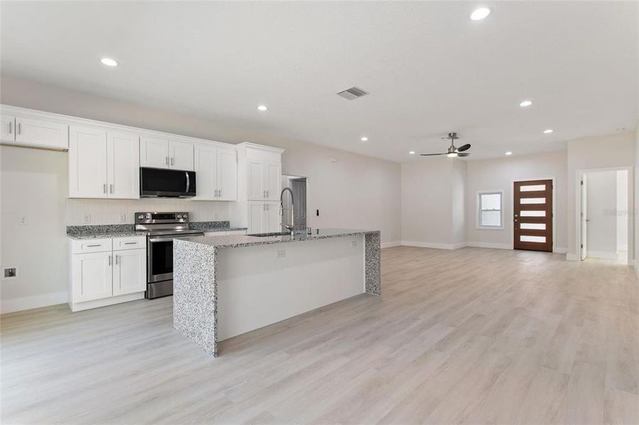 Furnished interior view inside a new home in , Indian Lake Estates (Image 8).