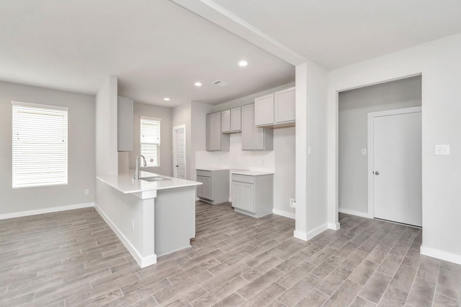 Take another look at this stunning kitchen. Sample photo of completed home with similar floor plan. Actual colors and selections may vary.