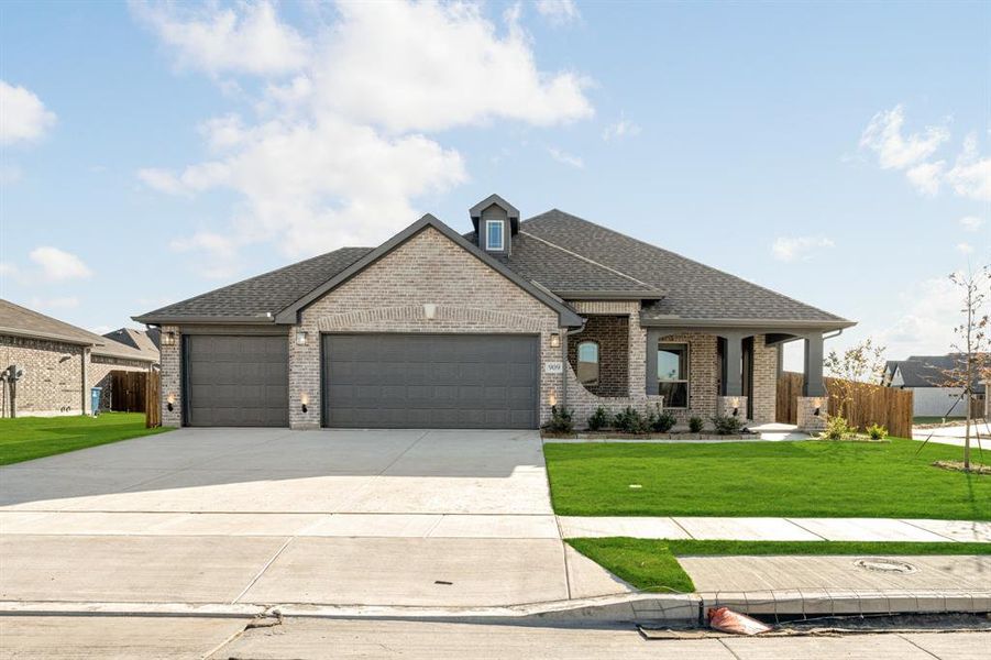 Front exterior of a new home in Waverly Estates, Josephine, TX, highlighting curb appeal (Image 2). Front exterior of a new home in Waverly Estates, Josephine, TX, highlighting curb appeal (Image 2).