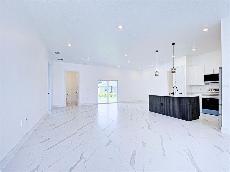 Spacious, unfurnished interior of a new home in , Rotonda West (Image 32).