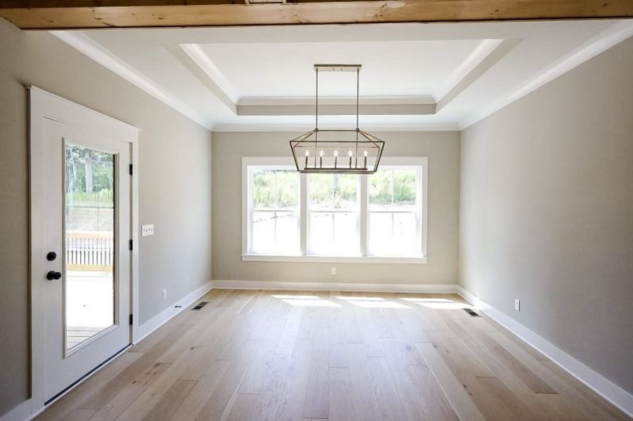 Spacious, unfurnished interior of a new home in Baker Road, Birchwood (Image 59).
