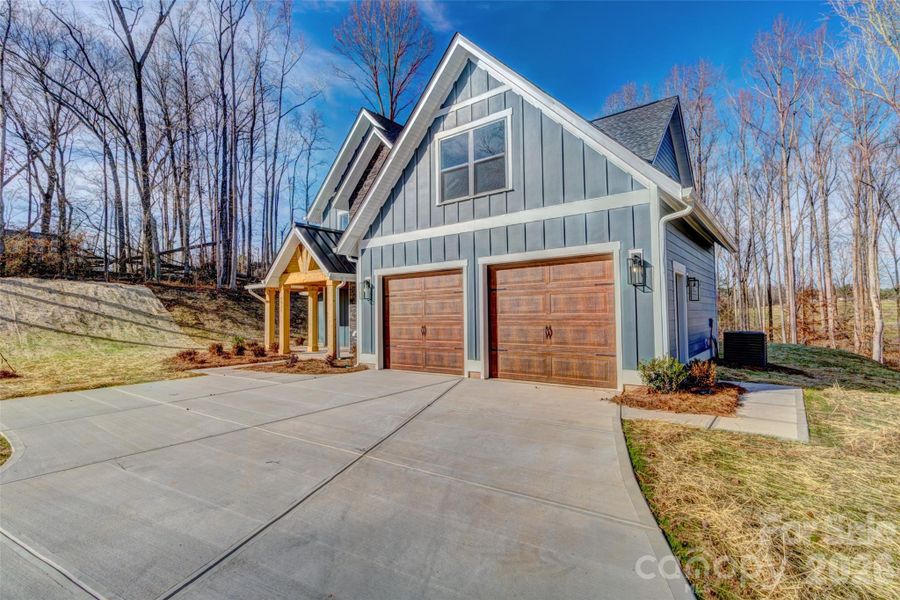 Front exterior of a new home in , Bessemer City, NC, highlighting curb appeal (Image 20).