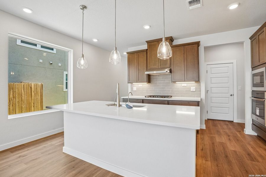 Furnished interior view inside a new home in August Fields, New Braunfels (Image 11).