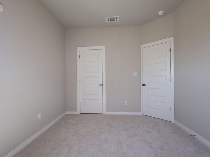 Spacious, unfurnished interior of a new home in Heritage, Dripping Springs (Image 8).
