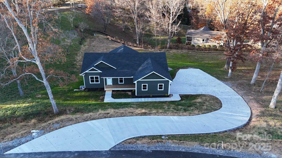 Front exterior of a new home in , Clyde, NC, highlighting curb appeal (Image 2).